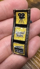 Universal Studios Hollywood Florida Gold Glitter Film Strip Ribbon Pin