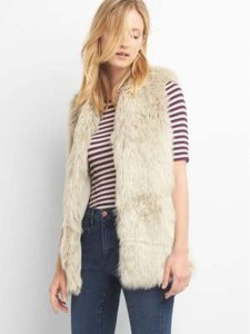 cream fuzzy vest
