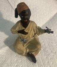 Vintage cold painted inkwell of a seated Arab holding a pipe