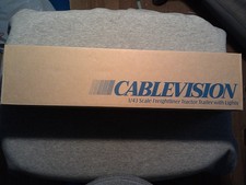 1/43/O- Scale ERTL Cablevision Freightliner Tractor Trailer with Lights. 1998.