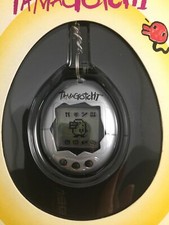 TAMAGOTCHI ORIGINAL-1997 VIRTUAL PET 1800 SILVER WITH BLACK ACCENTS BANDAI MIB