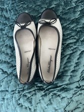 Vintage Salvatore Ferragamo Flats Size 6 1/2. Black and perforated white.