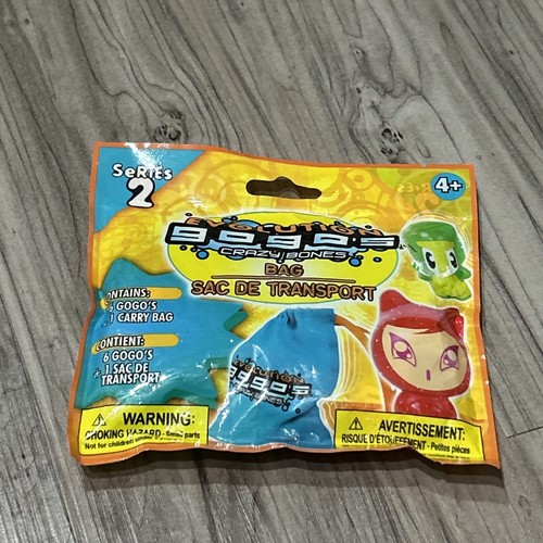 Gogo's Crazy Bones Series 2 Evolution Sealed. 6 Gogo's + 1 Carry Bag. Rare.