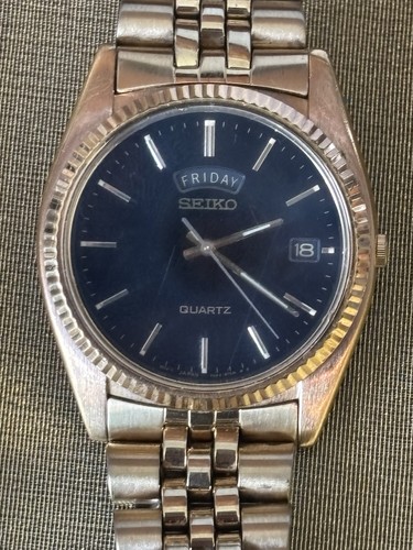 Vintage Seiko Quartz 36mm Black Face Gold Tone Mov't Japan Stainless Steel