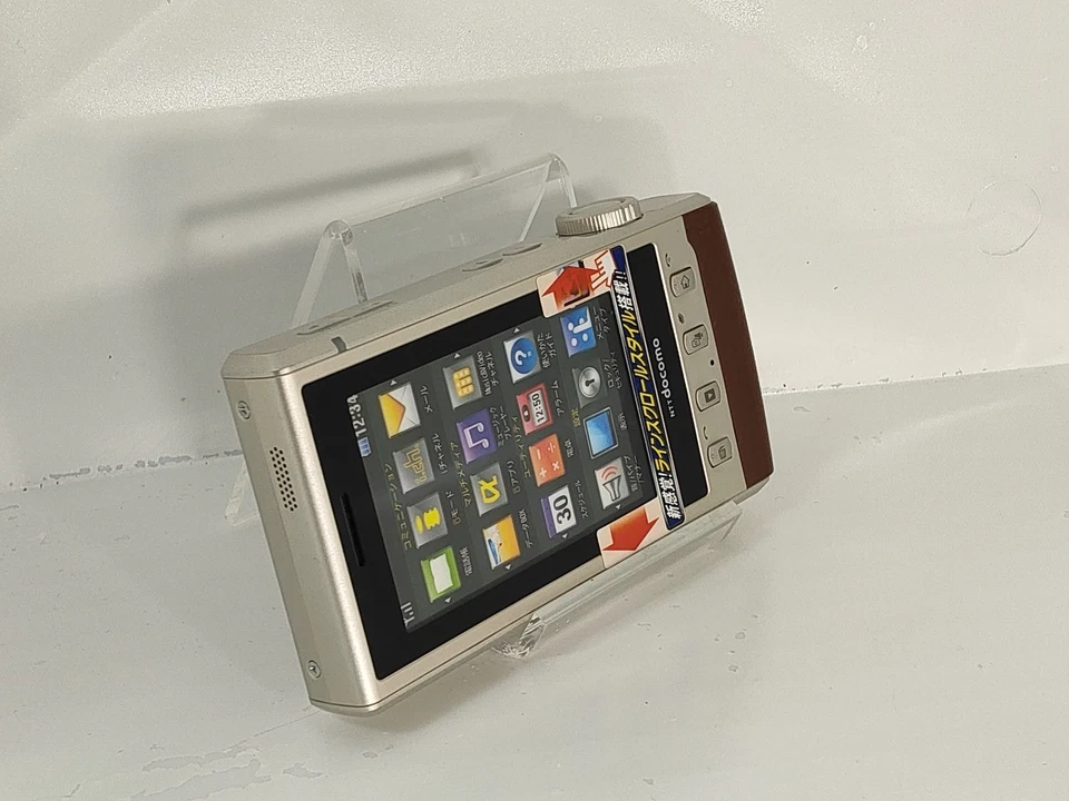 【¡Ficticio!】 Teléfono con cámara LG L-03C (color dorado) docomo-japón teléfono celular que no funciona Foto 2 de 3