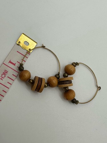 Lotto gioielli orecchini e braccialetti collana legno vintage - Foto 8 di 11