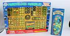 Marvelous Marbles Set 106 Marbles and a Tin of 100 Marbles total 206 marbles.