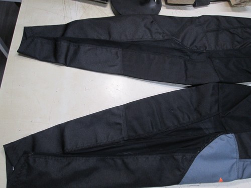 PANTALONES DE MOTOCROSS SHOT RACING - 32" CINTURA / ROLLO DEVO / NEGRO + NARANJA - Imagen 7 de 10