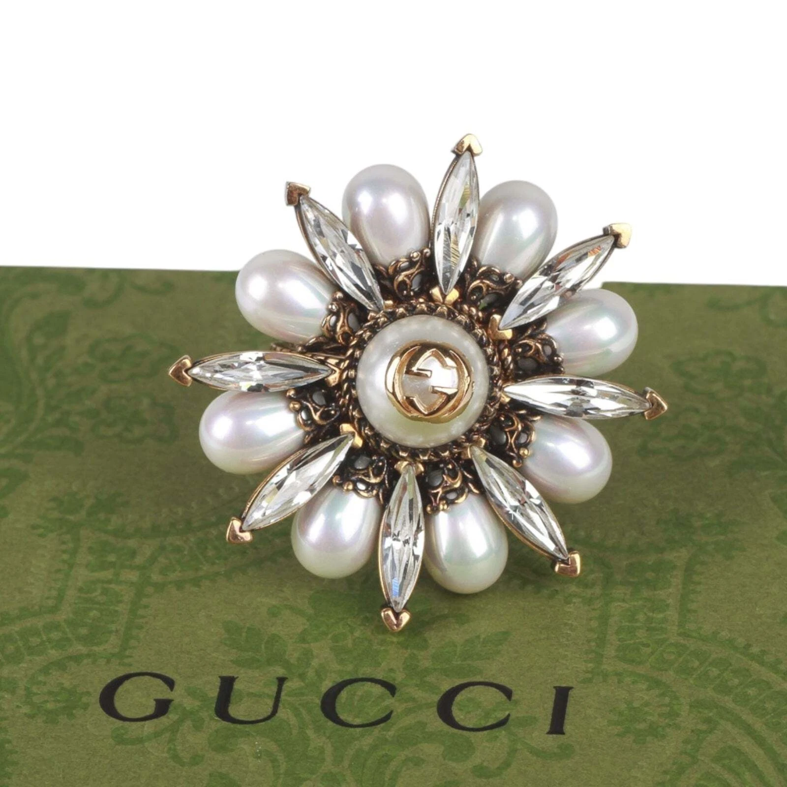 Authentique bague fleur Gucci imbriquée G