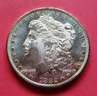 1882-CC MORGAN SILVER DOLLAR. UNCIRCULATED. HIGH GRADE.
