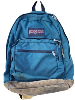 green jansport backpack leather bottom