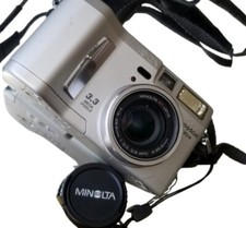 Vintage Minolta Silver DIMAGE S304 3.3MP 4x Digital Camera with Strap