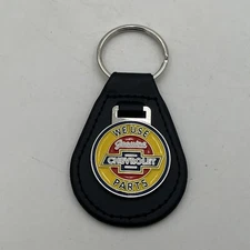 We Use Genuine CHEVROLET Parts VTG Style Sign METAL Enamel Leather KEYCHAIN Fob