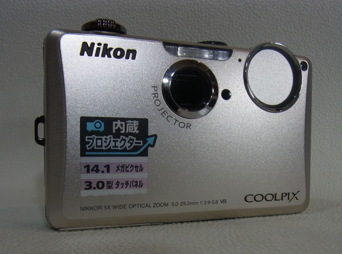 Nikon COOLPIX S1100PJ ,14MP,5x,3.0in,Silver with projector Nikon COOLPIX S1100PJ ,14MP,5x,3.0in,Silver with projector