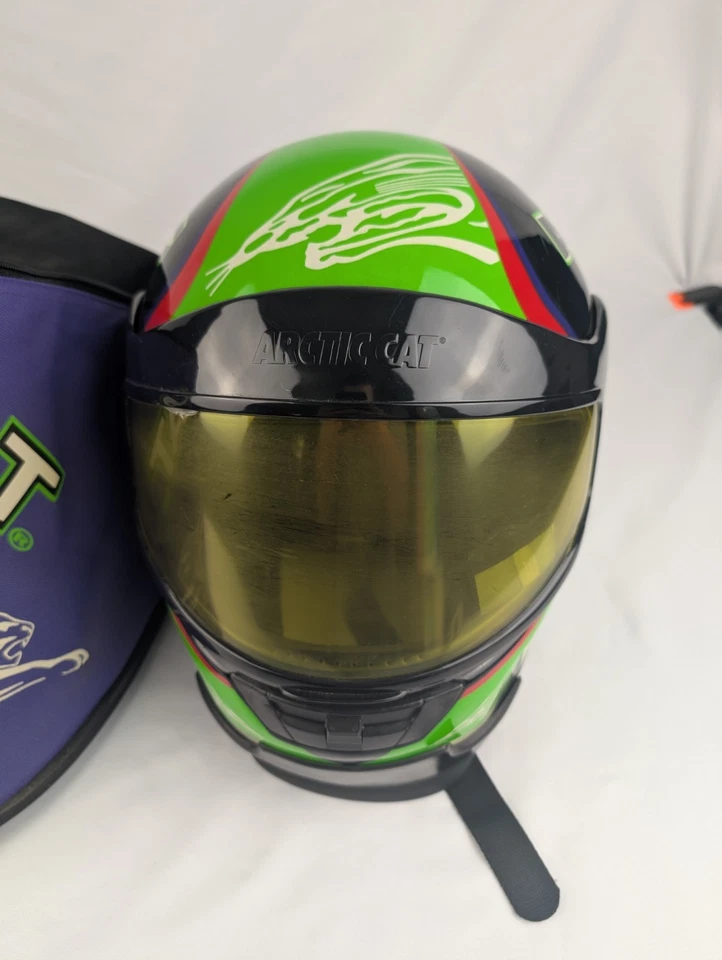 Casco de carreras de motos de nieve Team Arctic Cat talla S con funda verde años 90 Foto 2 de 4
