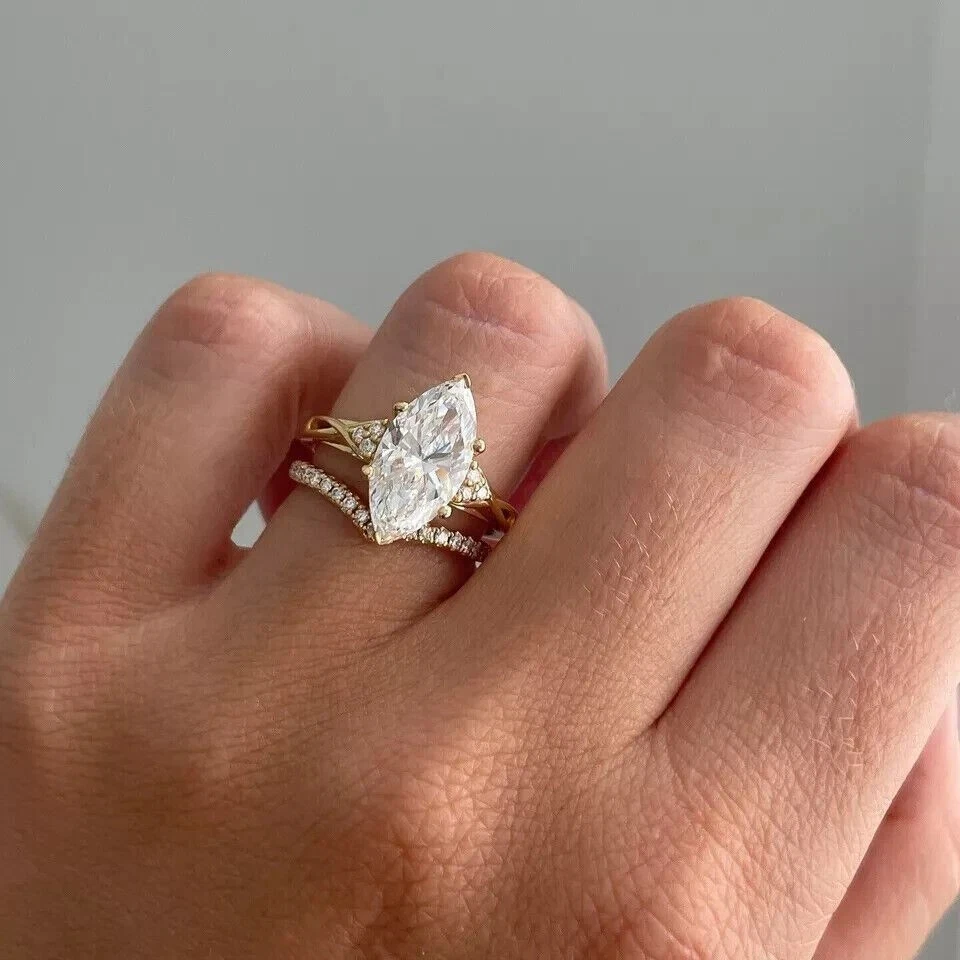 Anillo de compromiso de moissanita real enchapado en oro amarillo de 14 k de corte marquesa de 2,20 quilates Foto 2 de 4