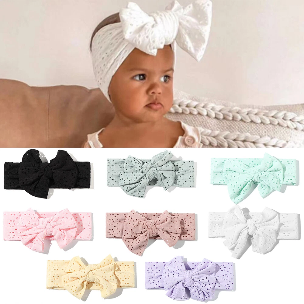 Baby with huge bow 2025