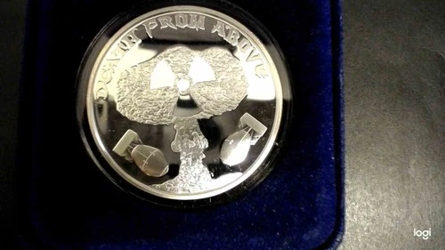 1 oz silver round DEATH FROM ABOVE.  Anonymous Mint. in a capsule