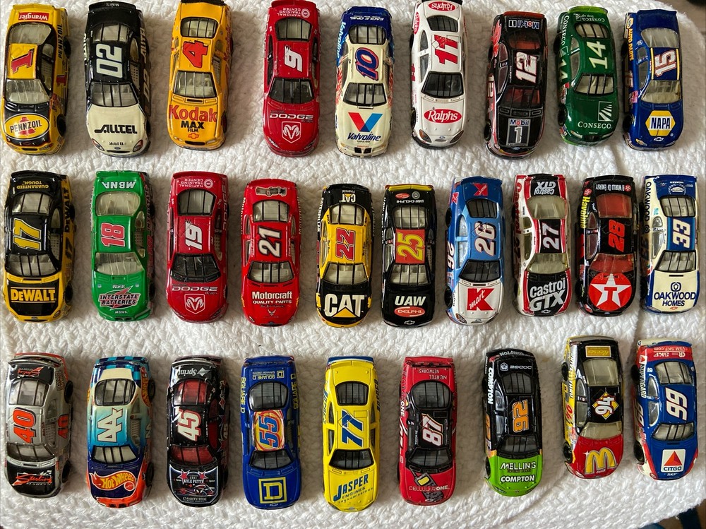 NASCAR Die Cast Set Of 28 Cars Collectables With #’’s and Spec Paint Schemes.