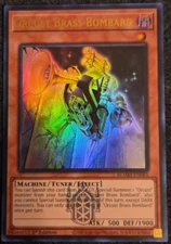 Orcust Brass Bombard - BLMM-EN083 - Ultra Rare - 1st Ed. - NM/M