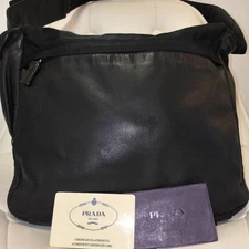 PRADA all leather black shoulder bag with authentication card embossed logo From