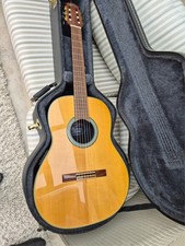 Applause by Ovation electro-acoustic guitar with nylon strings + custom case