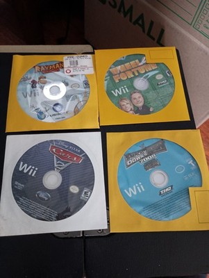 Lot 4 Nintendo Wii Rayman Origins, Wheel of Fortune, Cars 2 Smackdown 2008 DISCS