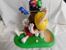 M Ms  Red Yellow Mulligan Ville with Brown Bag Candy Dispenser