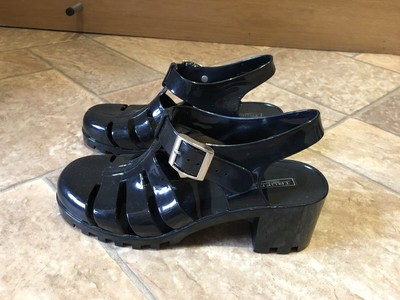 black jelly flip flops