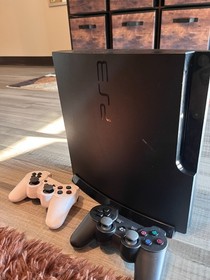 Ps3 slim console with 2 controllers 160gb