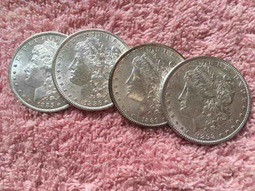 MORGAN SILVER DOLLAR COINS.  LOT OF 4  UNCIRCULATED   PRE. 1921 LOT # 16