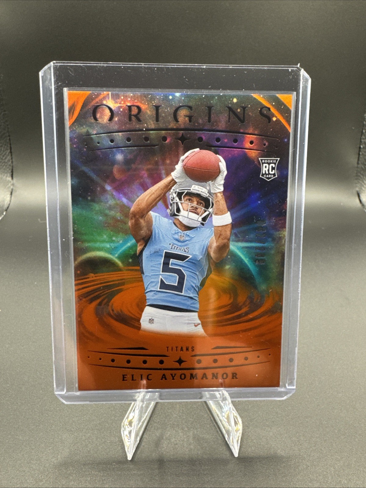 2025 Panini Origins - Rookies Elic Ayomanor, Elic Ayomanor #108 Holo Orange /249