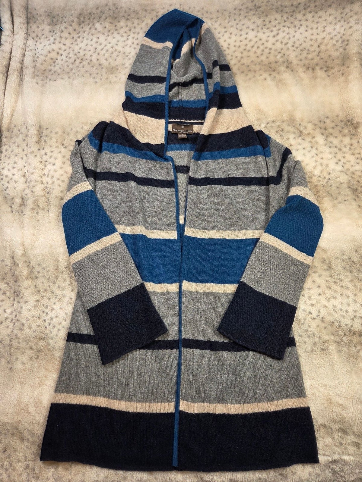 Cashmere hooded cardigan, folded flat