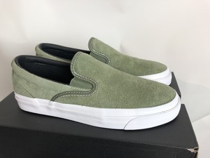 green slip on converse