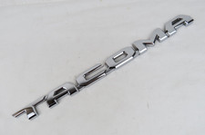 Genuine Oem 2016-2026 Toyota Tacoma Emblem Left Hand Front Door Badge Nameplate