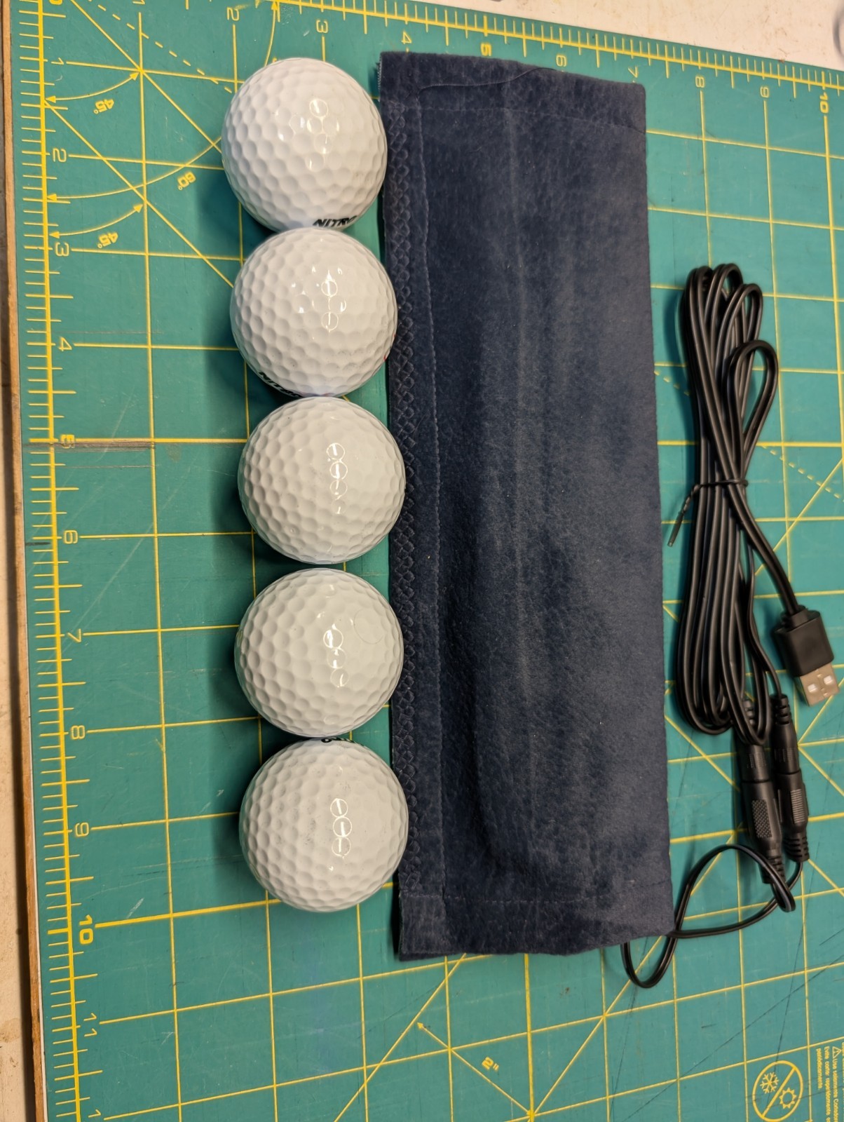 Golf ball heater, new, usb powered, 5 ball capacity