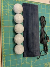 Golf ball heater, 15% more distance in cold weather, usb, works on golf cart.