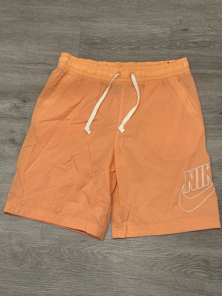 nike orange woven shorts