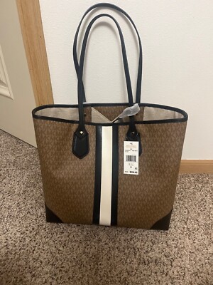 Brand New, Woman's Handbag Michael Kors Eva Large Tote with Matching Wallet.