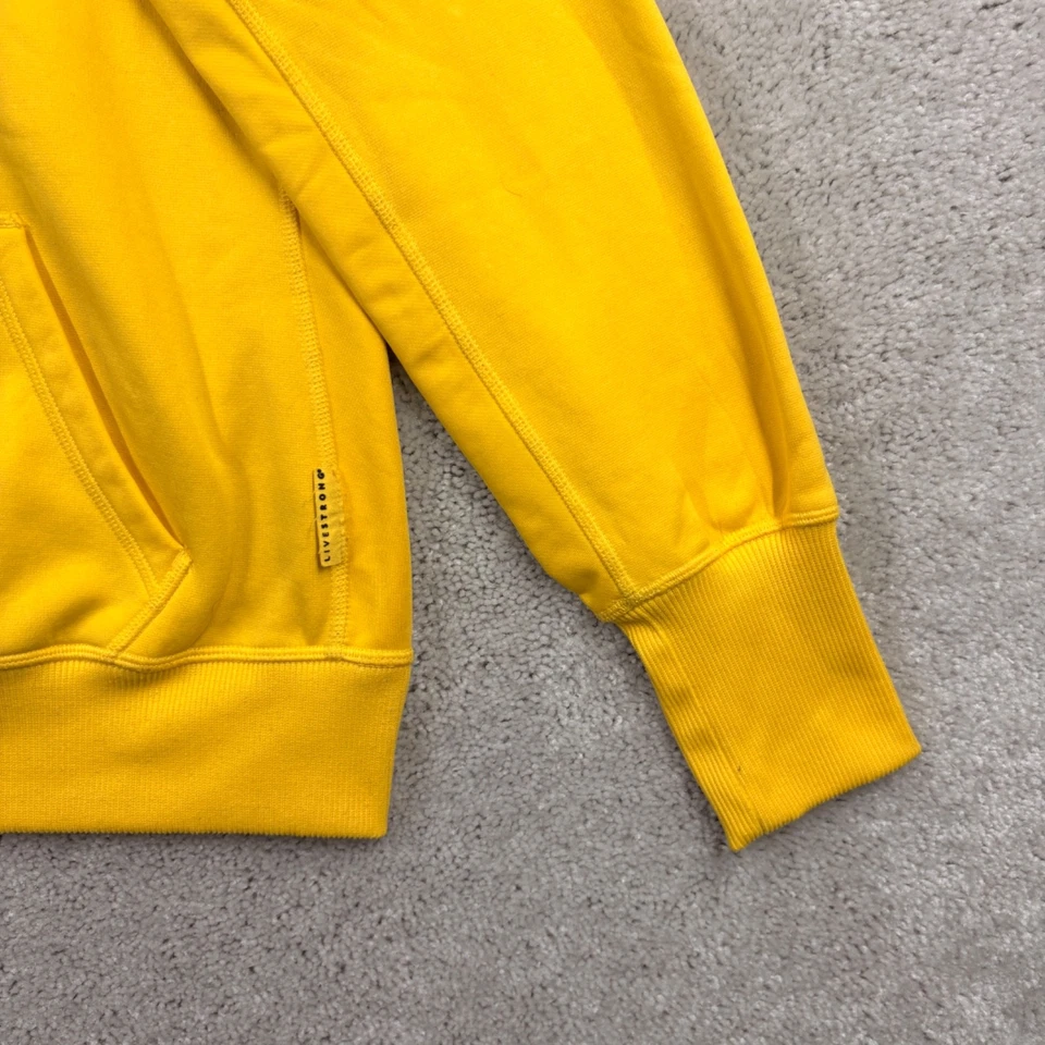 Sudadera con Capucha Nike Livestrong Para Mujer Talla Grande Amarillo Logo Terma Calce Bolsillos Foto 3 de 4