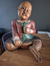 LARGE CARVED WOODEN PAINTED ORIENTAL FIGURE OF A BOY. 45cm TALL