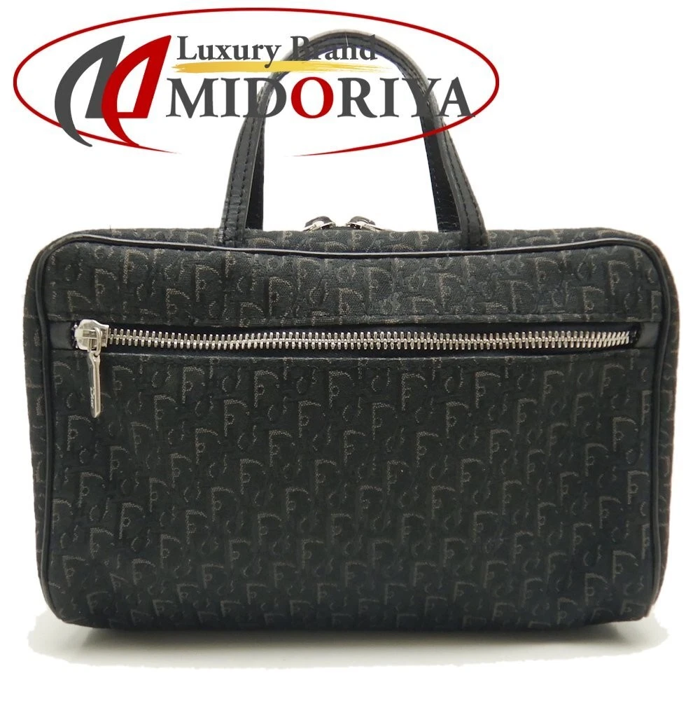 Sac à main Dior Vérité de Voyage trotteur toile x cuir noir 252447 occasion