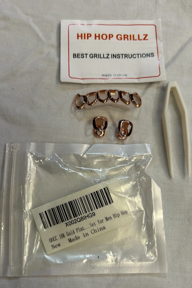 Dientes de hip hop chapados en oro de 18 quilates Grillz oro rosa... Dang That’s Hot. Y se envía rápido Foto 3 de 3