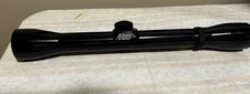 Vintage rifle scope from Bushnell's Banner series,  fixed 4x magnification.(DDB)