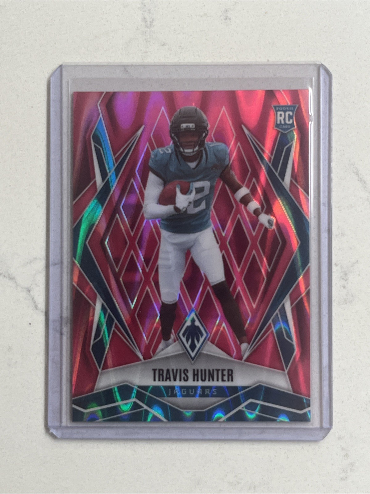 2025 Panini Phoenix Travis Hunter PINK SEISMIC ROOKIE  /75 (RC)  #157