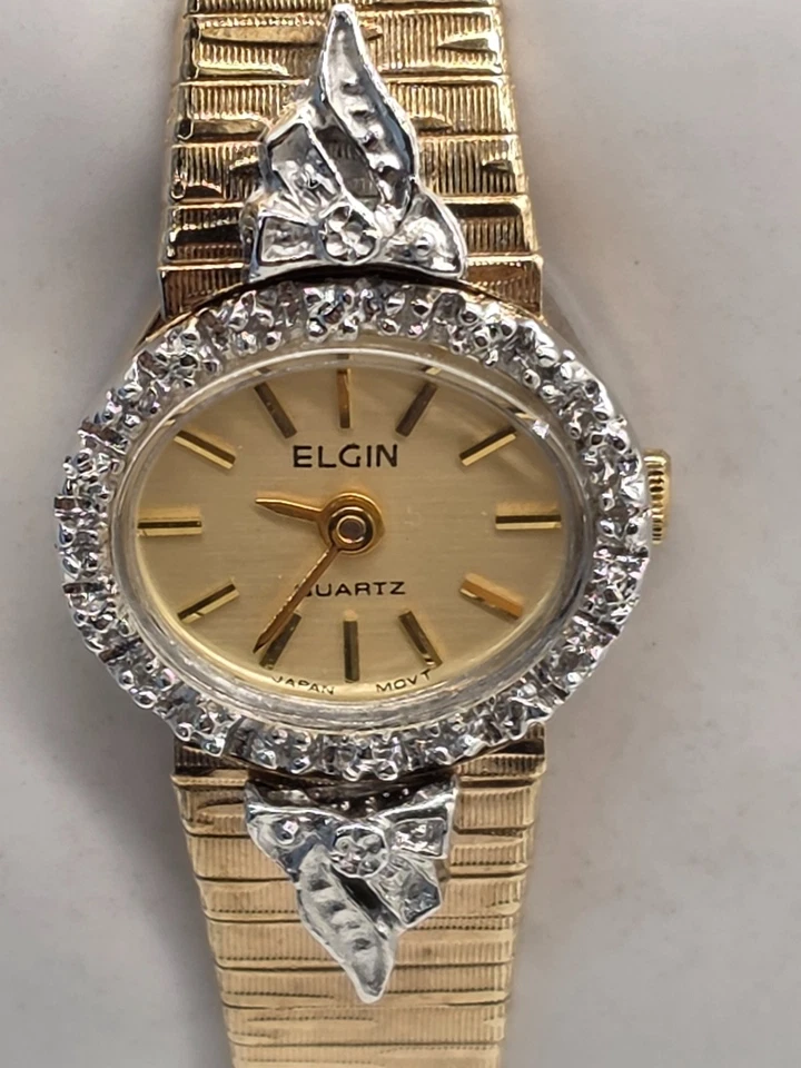 Reloj de cuarzo Elgin Lady tono dorado esfera amarilla claudette con caja detalles de diamantes Foto 3 de 4