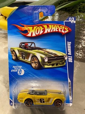 2010 Hot Wheels #131 Faster Than Ever 3/10 TRIUMPH TR6 Yellow Variation w/FTE Sp