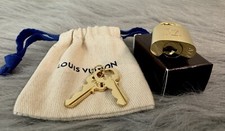   Brand New Authenthic Louis Vuitton Shinny gold Padlock 677 withTwo Keys  