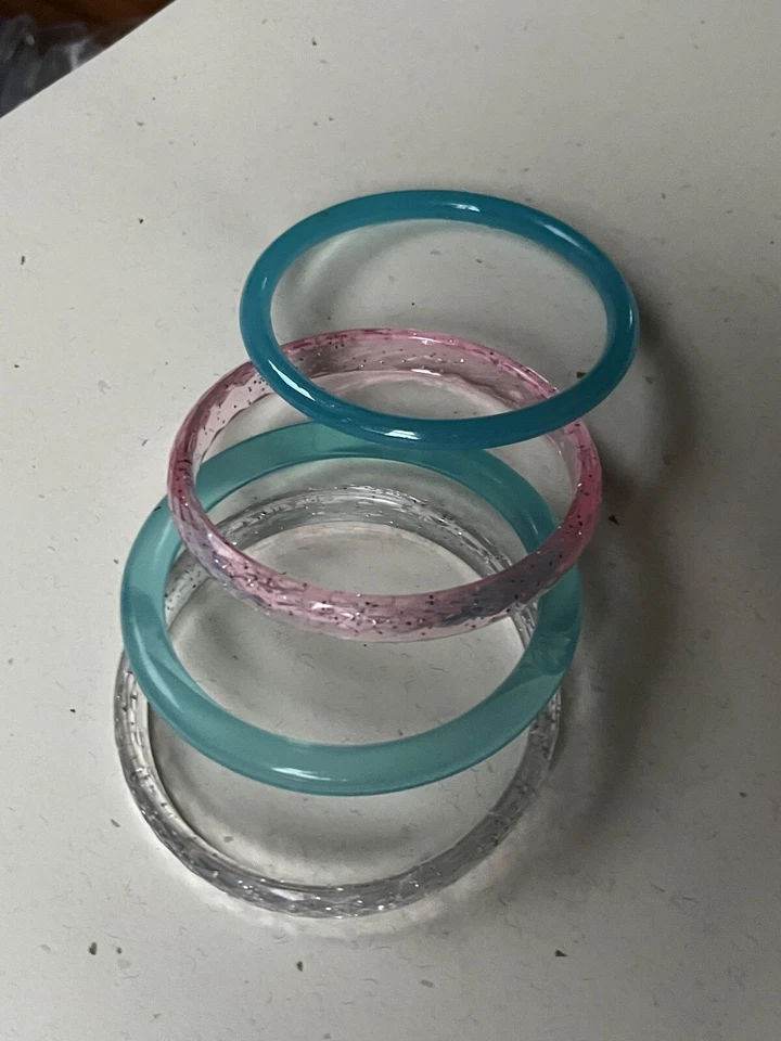 Lote de Pulseras Brazalete Plástico Azul Cielo y Rosa Claro y Facetado Transparente con Burbujas Foto 2 de 4