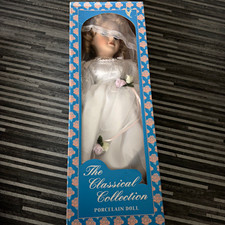 Classical Collection Porcelain Girl Doll Blue Eyes Brown Curly Hair Boxed
